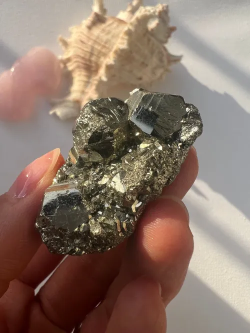 Magnified view of pyrite micro-fractures under lighting