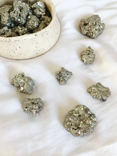 Museum conservator restoring decaying pyrite artifacts