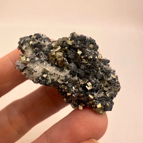 Pyrite specimens stored with humidity control in museum setting